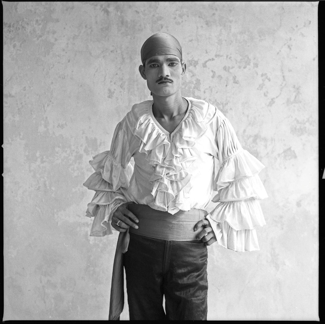 A performer poses for a portrait. Photo by Jonas Spinoy.