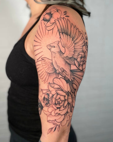 Tattoo designed by floral artist Lu Loram Martin, based in Toronto, Canada.
