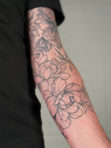 Healed floral tattoo by artist Lu Loram Martin, in Toronto, Canada.