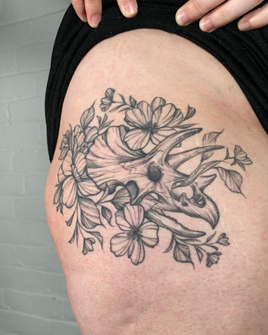 Bold & fineline blackwork floral tattoo. Designed and created by Lu Loram-Martin, Toronto, Canada