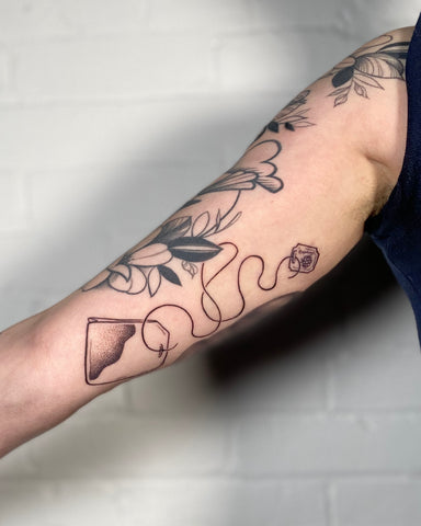 Tattoo designed by floral artist Lu Loram Martin, in Toronto, Canada.