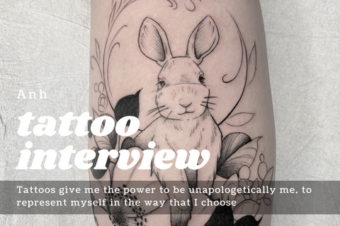 image shows a beautiful delicate black work rabbit tattoo with flowers, by by lu loram martin, top large bold blackwork floral tattoo specialist, and illustrator, based in toronto, canada, best