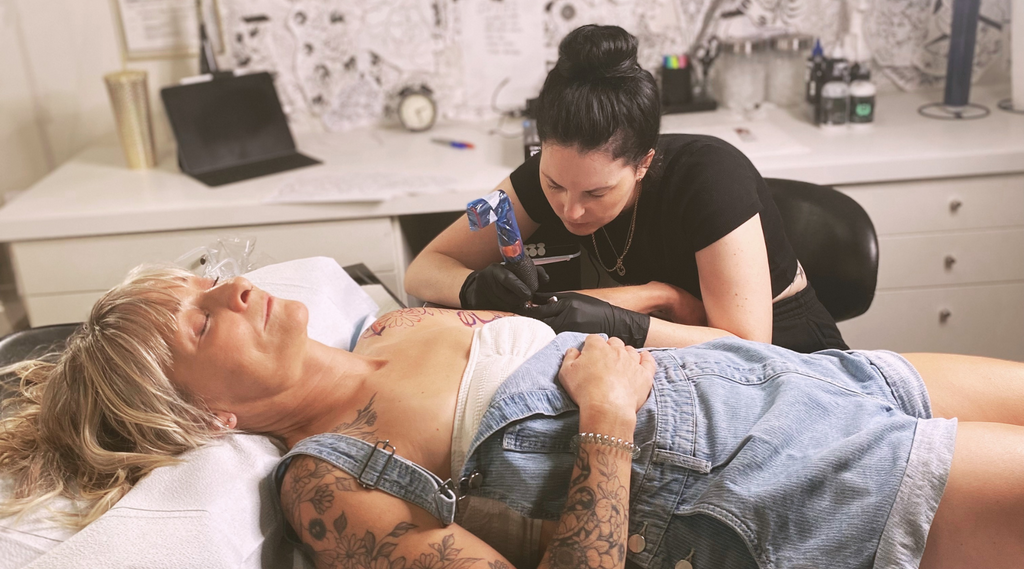 Lu Loram Martin tattooing in her private studio in Toronto, Canada.
