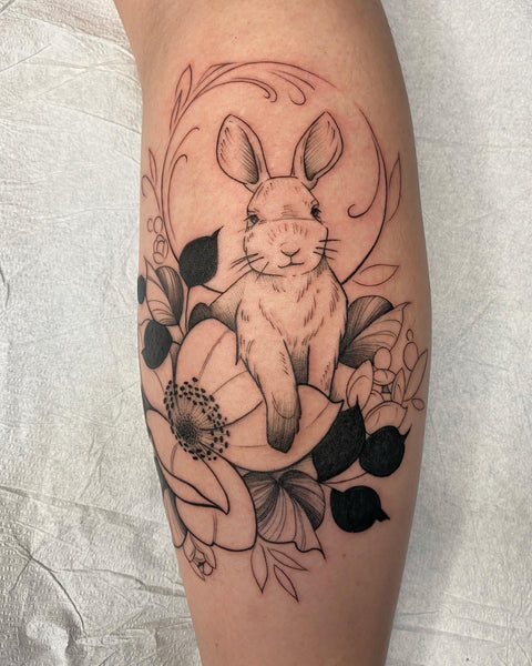 Rabbit tattoo by lu loram martin, top large bold blackwork floral tattoo specialist, and illustrator, based in toronto, canada, best