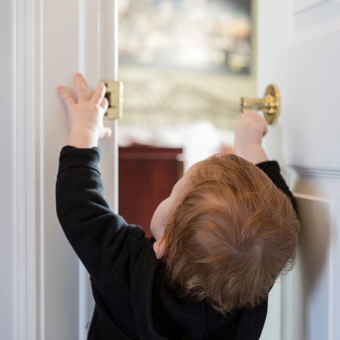 baby opening door