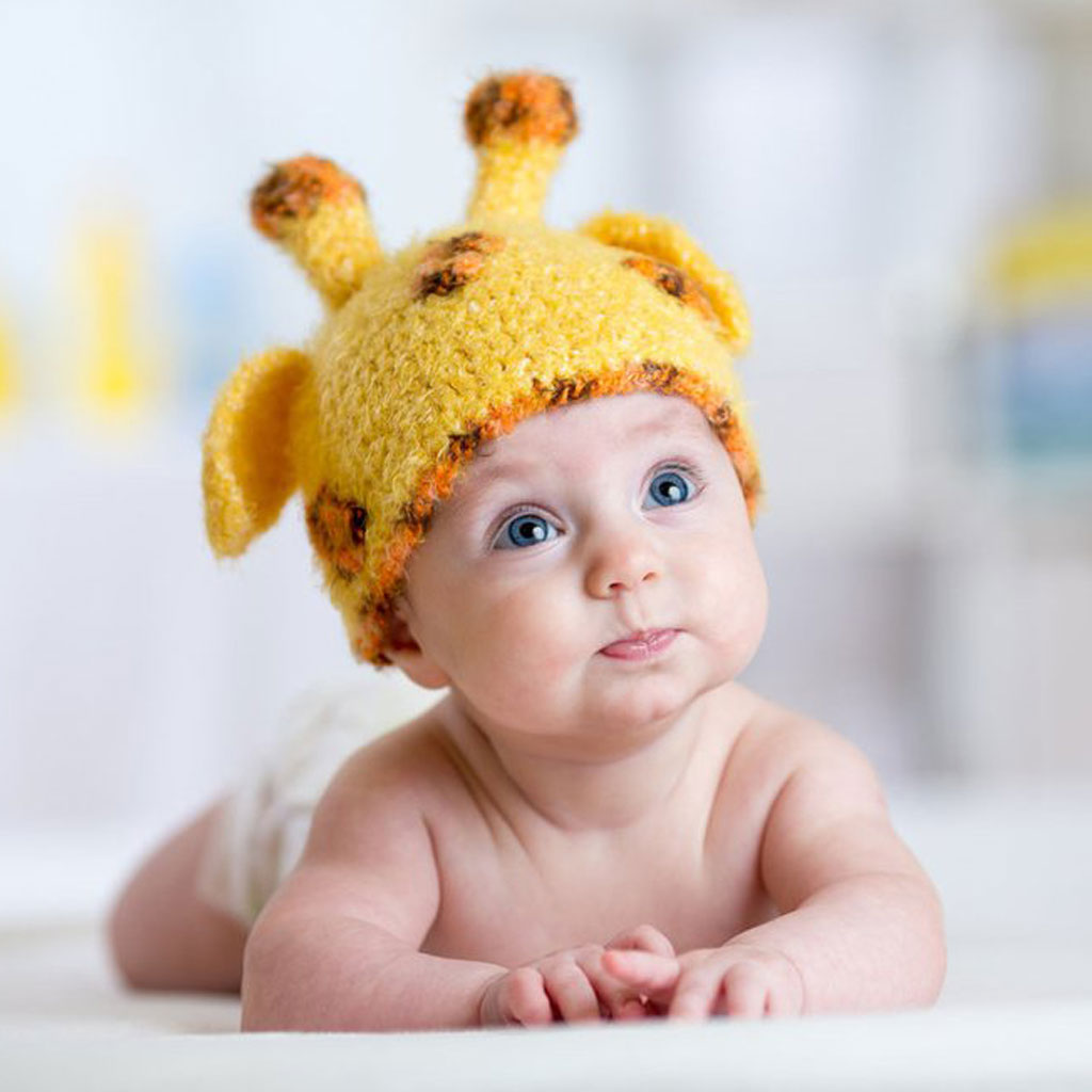 baby boy crawling development milestone showing motor skills