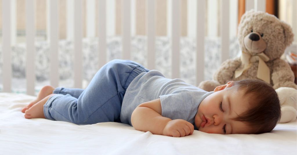 child development stages your baby will roll over while they are asleep