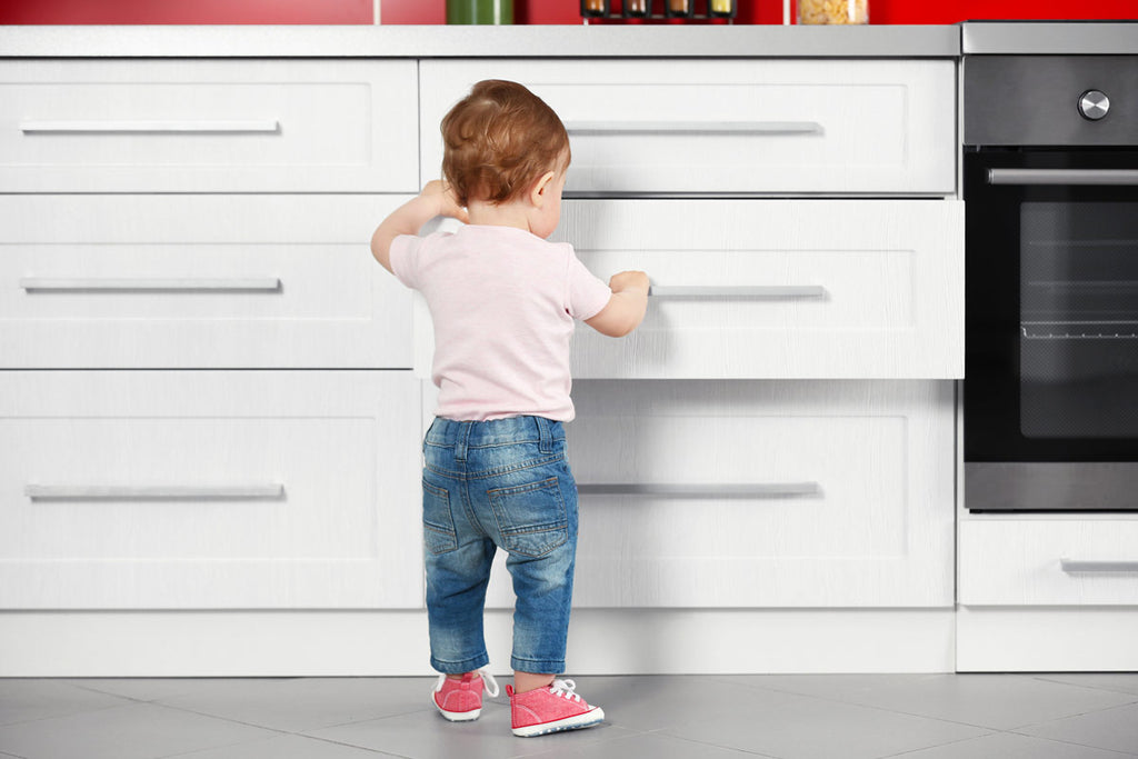 Toddler opening kitchen cupboards without baby proof locks