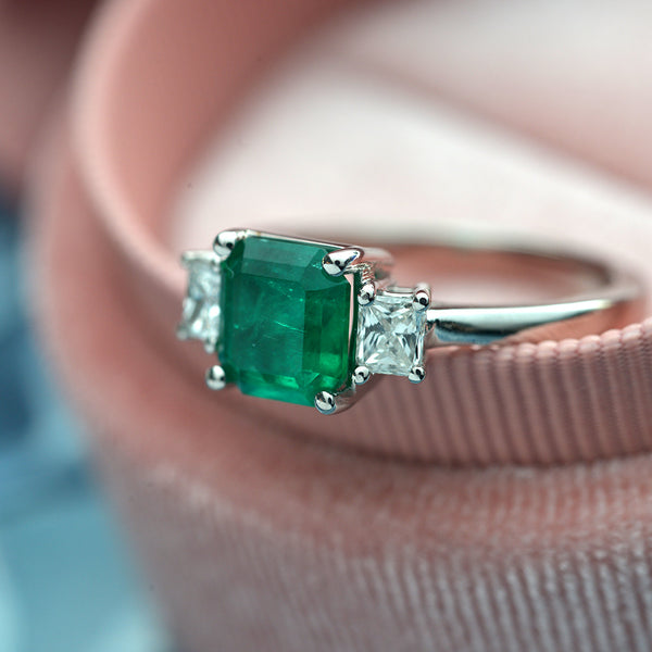 Emerald and Diamond Three Stone Platinum Ring | FlawlessCarat