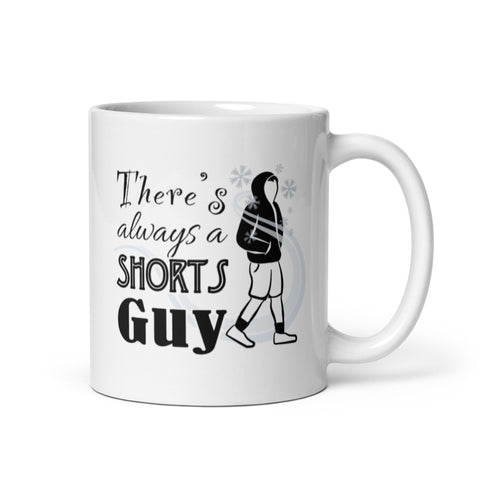 This Coffee mug shows Shorts Guy walking in the snow 