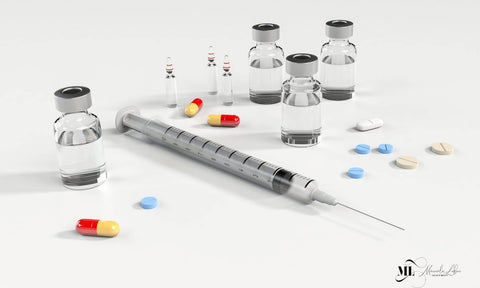 An assortment of IVs, tablets, capsules and a syringe | Anti Aging