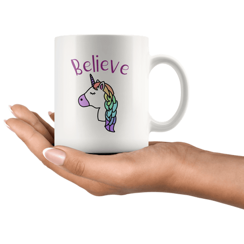 unicorn mug in hand