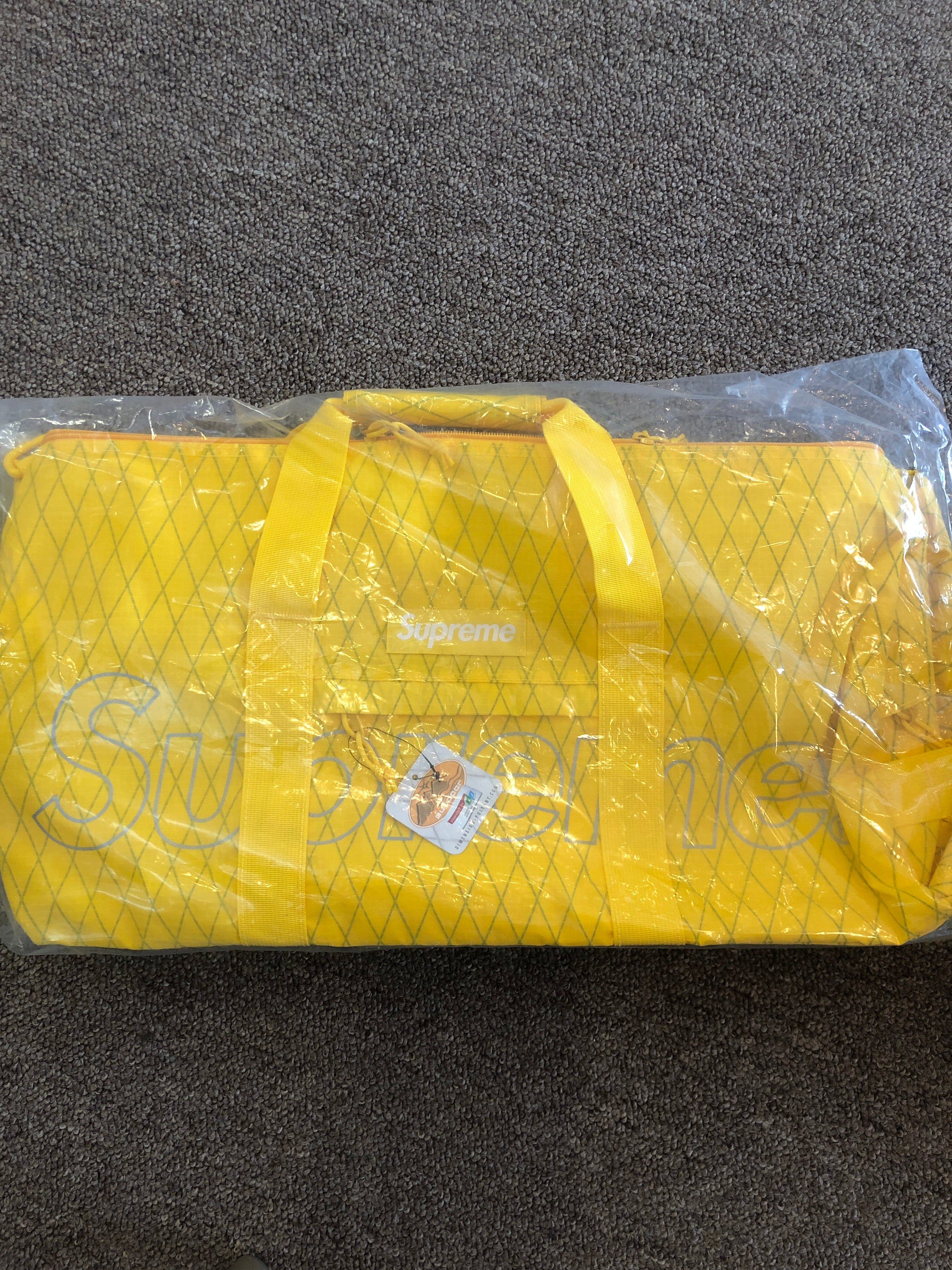 supreme yellow duffle bag
