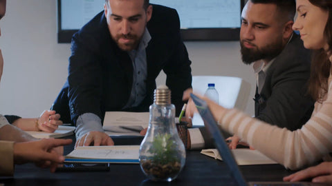 People working at a Dark Canadian Oak office desk