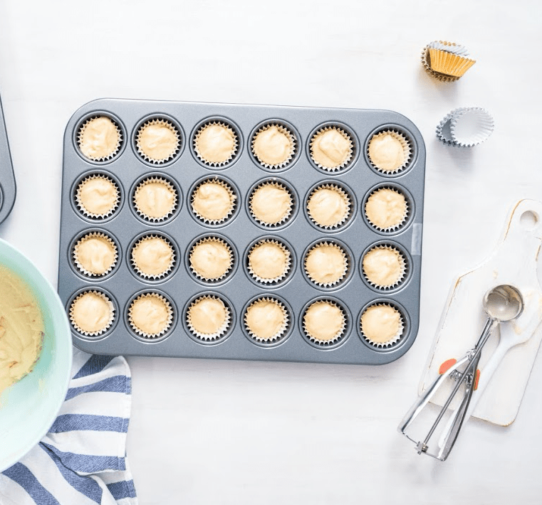 https://cdn.shopify.com/s/files/1/0012/7071/0307/files/better-houseware-muffin-pastry-pans-mini-muffin-cupcake-pan-24-cups-28901387010083.png?v=1690803548&width=900