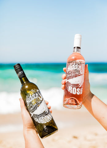 Two bottles of wine at the beach