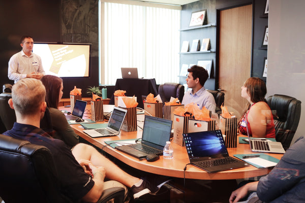 A man standing in a conference room