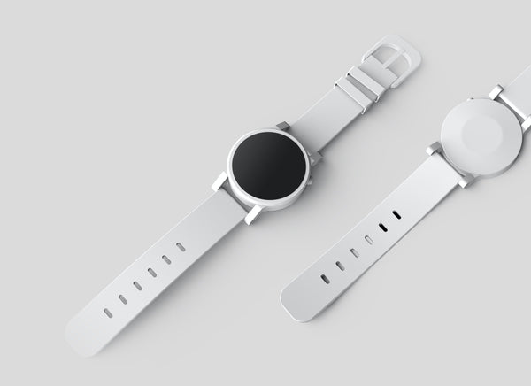 Image of two wristwatches with white straps