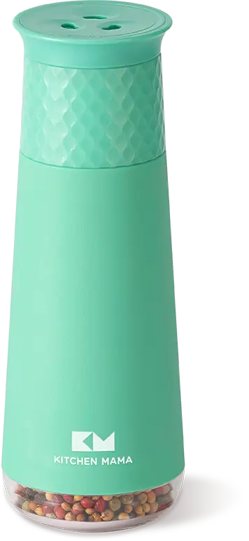 Green Kitchen Mama spice grinder with a textured top and transparent base showcasing colorful pepper corns inside.