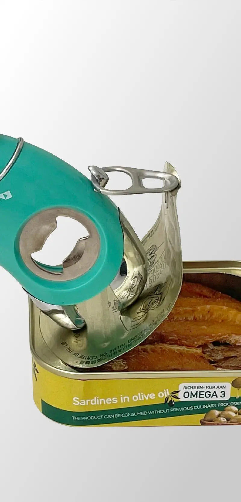 Green Kitchen Mama opener lifting sardine can lid, demonstrating strength and precision for pull-tab cans.