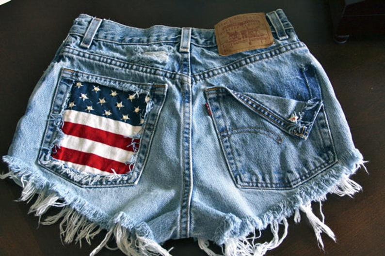 white jean shorts with american flag pockets