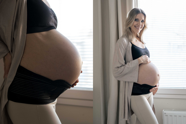 Physiotherapist Johanna smiling while wearing the Lola&Lykke pregnancy support belt