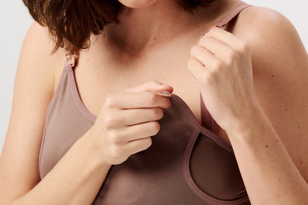 a woman's wearing pumping and nursing bra by Noppies