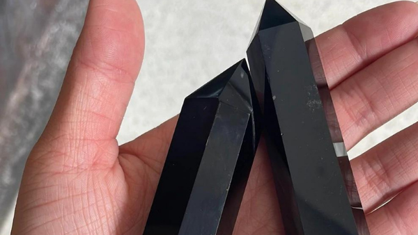 black obsidian in a palm