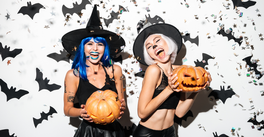 girls in halloween witch costume
