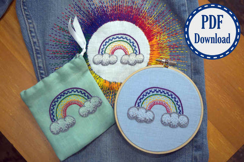 Three finished hand embroidered rainbows - one one a bag, one in an embroidery hoop, and one appliqued on a pair of jeans - as finished products of a digital tutorial