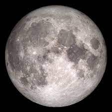 Close up photograph of the moon showing craters and plains, taken by NASA