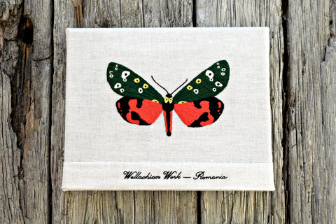 Scarlet Tiger Moth Butterfly embroidered on grey linen in Romanian stitch