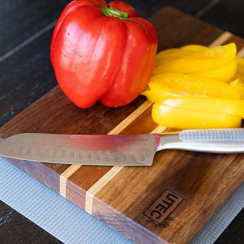 Knife on a cutting board.