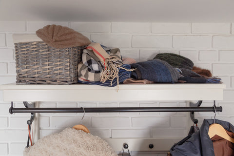 Baskets are a coat closet organization must.