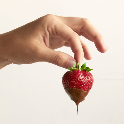 A Chocolate Dipped Strawberry using the Chocolate Magic Shell Recipe by Vosges