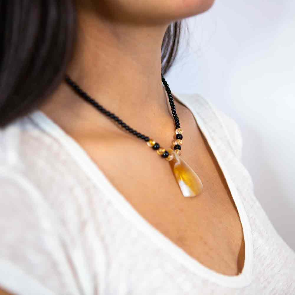 citrine and onyx necklace modeled on neck