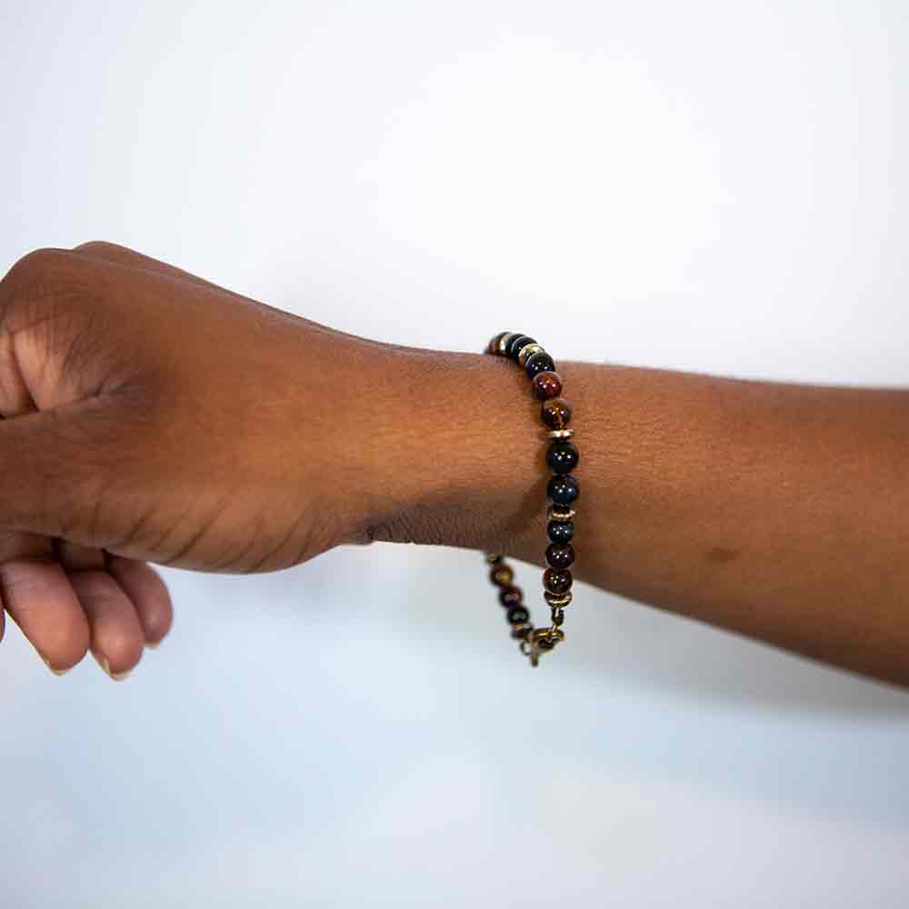 tiger eye and pyrite bracelet modeled on wrist