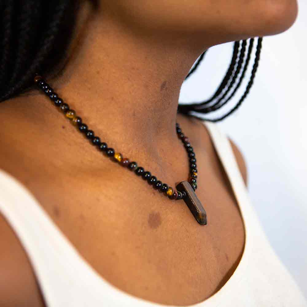 tiger eye and pyrite necklace modeled on neck