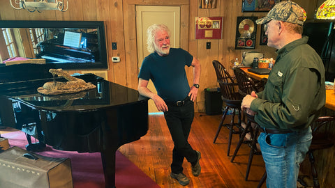 Talking Conservation – and music – with Chuck Leavell (left) in the lodge at CharLane Plantation.
