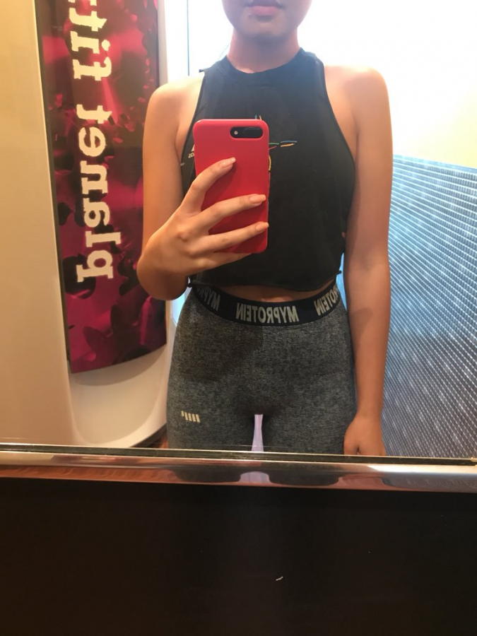 Is it OK to wear only a sports bra at the gym?