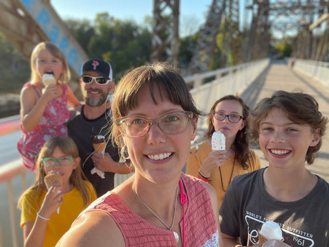 family portrait of everyone enjoying ice cream on the BDI bridge