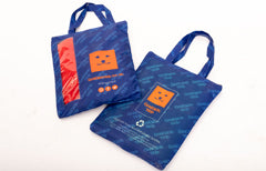 Recycled plastic bottles turned into reusable bags for Ginger Ted dog products