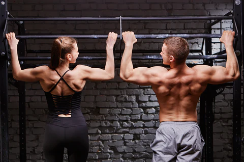 couple doing pullups to increase strength