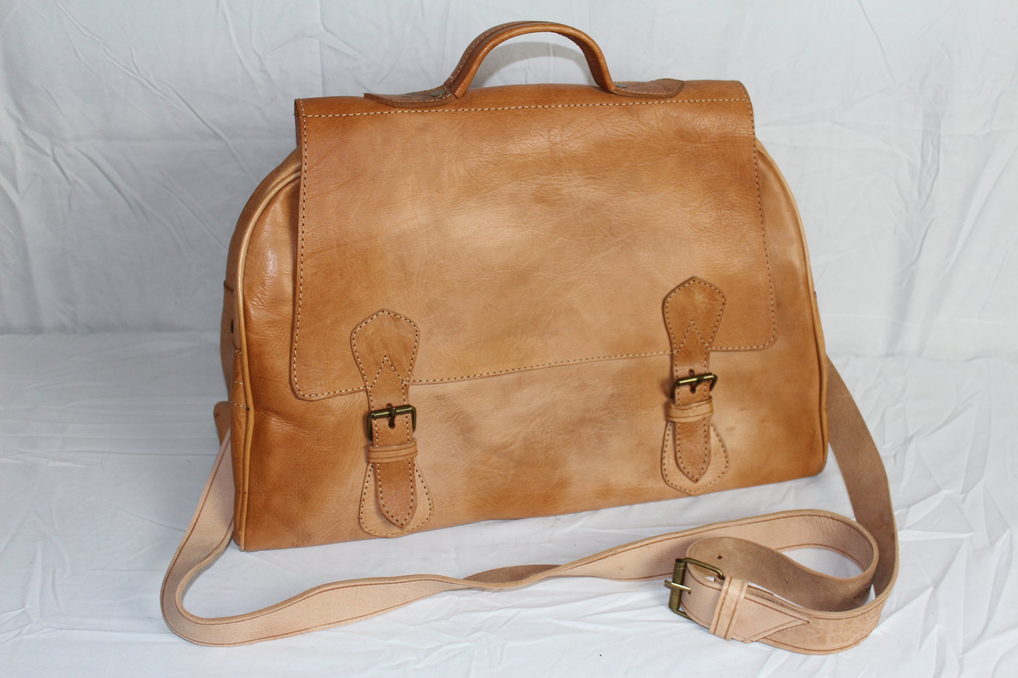 small leather duffel