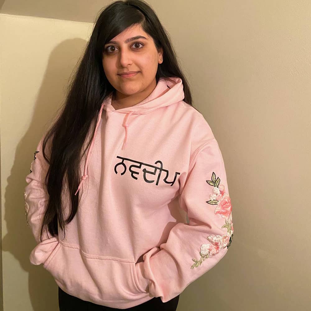 light pink personalised hoodie in punjabi with pink floral sleeve embroidery