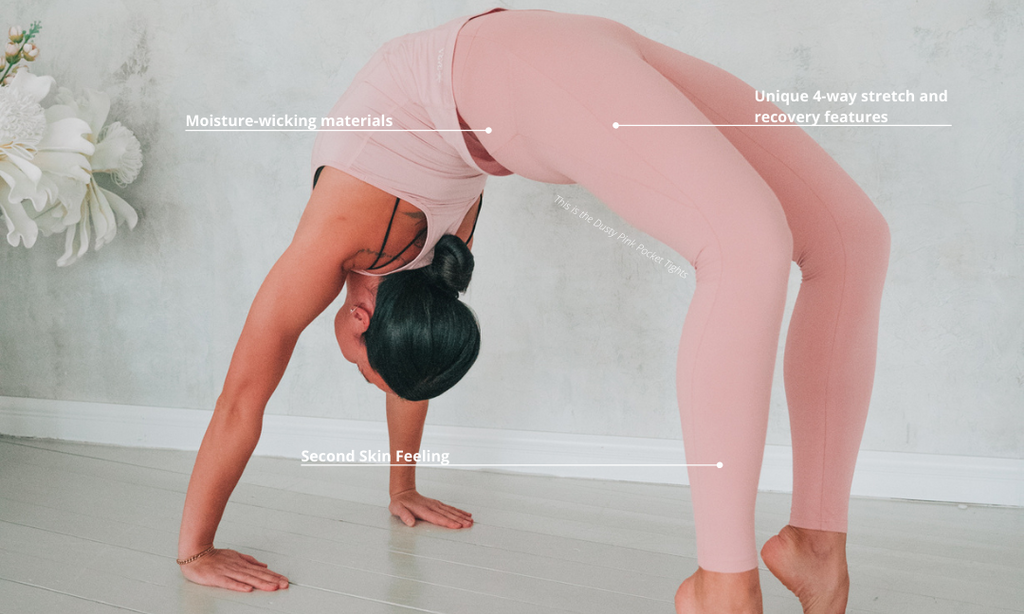 Woman doing yoga in pink tights/leggings. She is standing up-side-down.