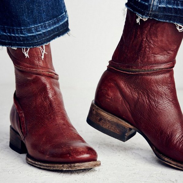 brown boots with red zipper