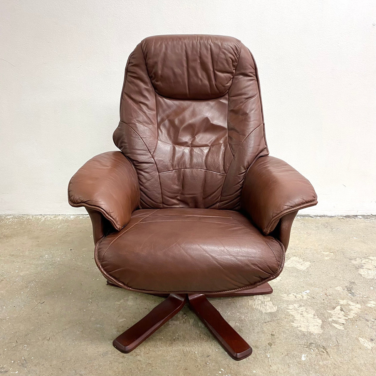 brown leather swivel recliner chair