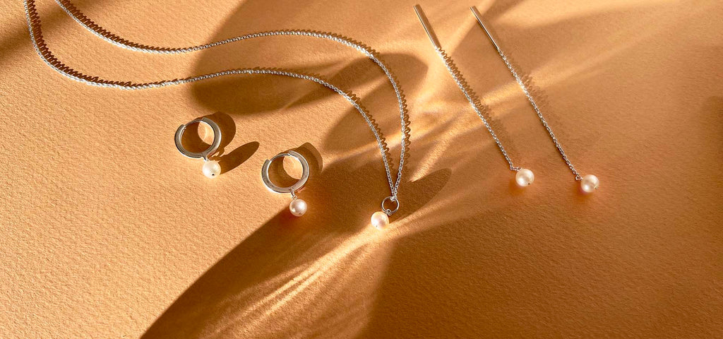 Ethically made jewelry featuring pearls and silver