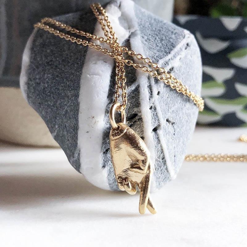 GOLD LUCK CHARM NECKLACE